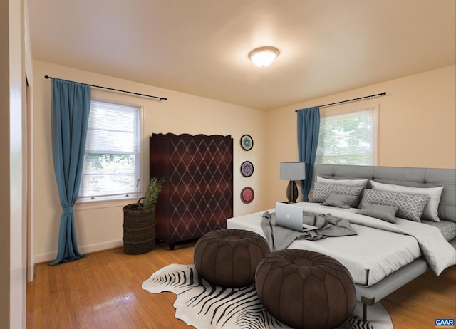 821 Cabell Ave Unit A & B, Charlottesville, VA 22903 - bedroom with light wood finished floors and baseboards