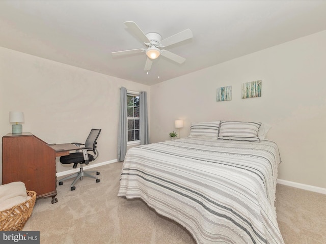 9034 Allington Manor Cir W, Frederick, MD 21703 - bedroom featuring light colored carpet, baseboards, a desk, and a ceiling fan