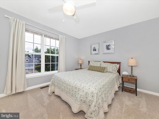 9034 Allington Manor Cir W, Frederick, MD 21703 - bedroom featuring baseboards, light carpet, and a ceiling fan