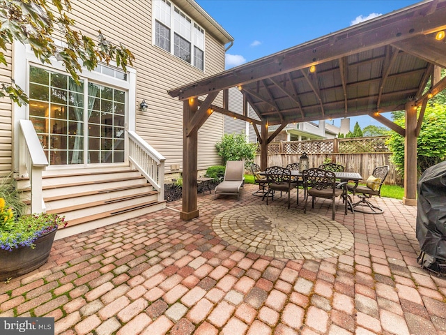 9034 Allington Manor Cir W, Frederick, MD 21703 - view of patio / terrace featuring a gazebo, entry steps, fence, and outdoor dining area
