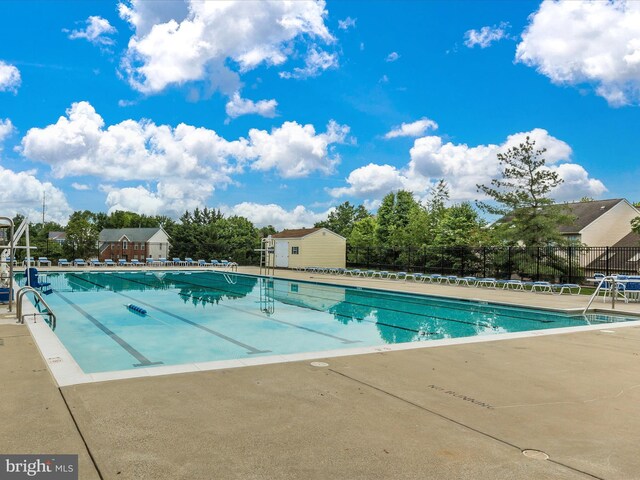 9034 Allington Manor Cir W, Frederick, MD 21703 - community pool with fence and a patio area