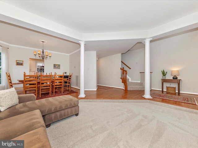 9034 Allington Manor Cir W, Frederick, MD 21703 - living room featuring a chandelier, carpet, stairs, and baseboards
