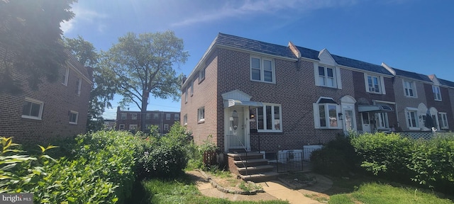 view of front of property with brick siding