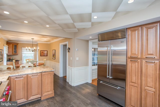 3864 Spring Valley Rd, Doylestown, PA 18902 - kitchen with built in fridge, dark wood-type flooring, crown molding, light stone countertops, and a chandelier