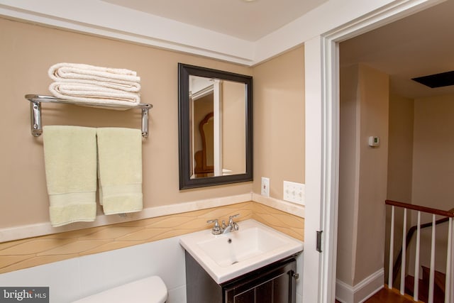 3864 Spring Valley Rd, Doylestown, PA 18902 - bathroom with vanity, toilet, and decorative backsplash