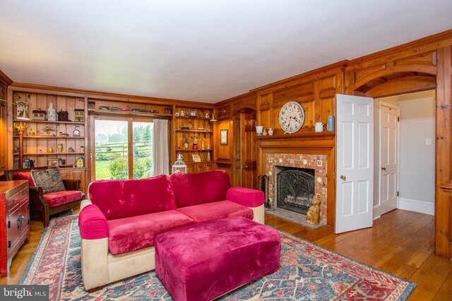 3864 Spring Valley Rd, Doylestown, PA 18902 - living area with hardwood / wood-style floors and a brick fireplace