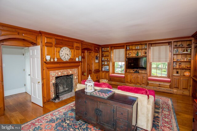 3864 Spring Valley Rd, Doylestown, PA 18902 - living area featuring wood finished floors and a tiled fireplace