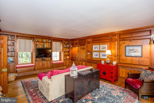 3864 Spring Valley Rd, Doylestown, PA 18902 - living room featuring wood finished floors and wood walls