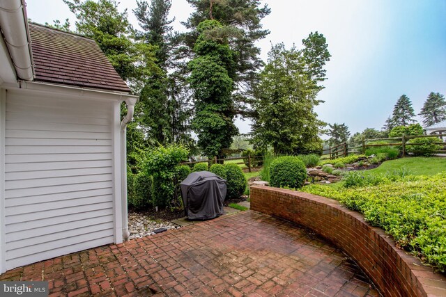 3864 Spring Valley Rd, Doylestown, PA 18902 - fenced backyard with a grill and a patio area