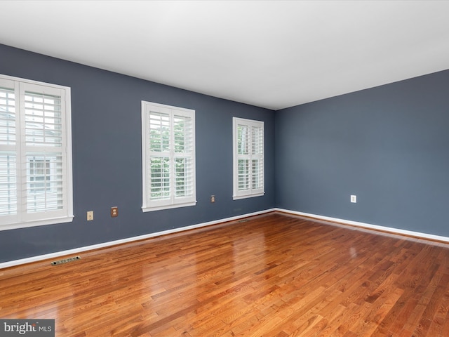 6521 Kemper Lakes Ct, Alexandria, VA 22312 - spare room featuring wood finished floors and baseboards