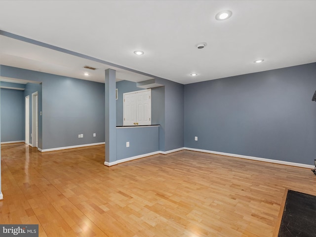 6521 Kemper Lakes Ct, Alexandria, VA 22312 - unfurnished living room with light wood finished floors, baseboards, and recessed lighting