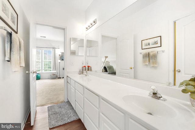 13304 Tivoli Fountain Ct, Germantown, MD 20874 - full bathroom with double vanity and wood finished floors