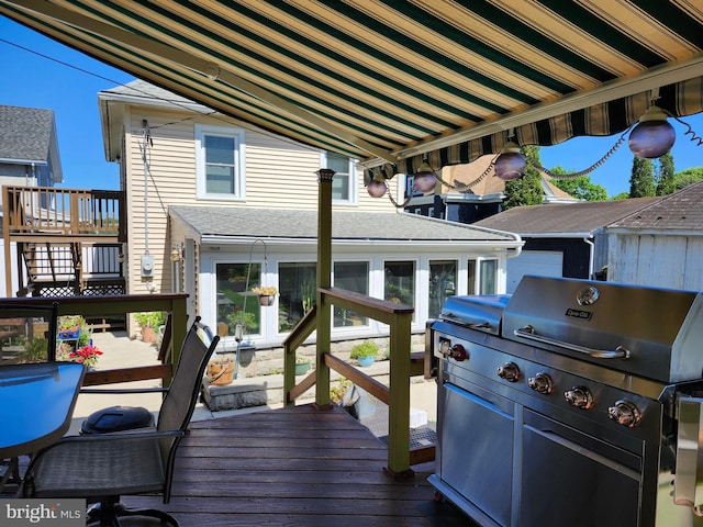 wooden terrace with grilling area