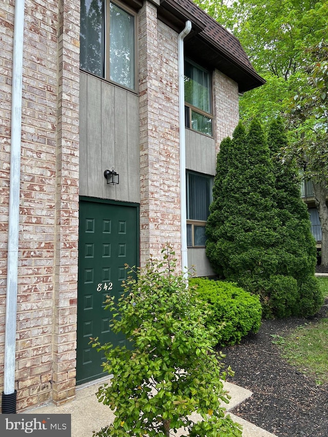 842 Putnam Blvd Unit 60A, Wallingford, PA 19086 - property entrance featuring brick siding