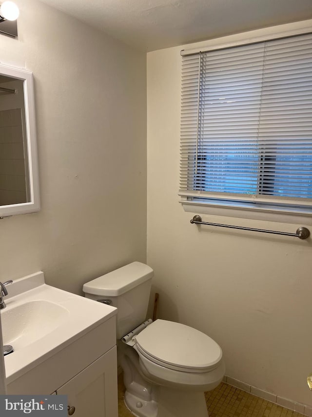 842 Putnam Blvd Unit 60A, Wallingford, PA 19086 - bathroom with toilet, vanity, and tile patterned flooring