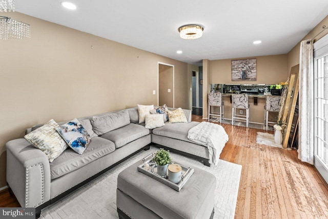 10103 Wimbledon Ct, Manassas, VA 20110 - living area with wood finished floors, healthy amount of natural light, recessed lighting, and baseboards