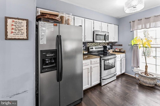 10103 Wimbledon Ct, Manassas, VA 20110 - kitchen featuring stainless steel appliances, white cabinetry, dark wood-type flooring, tasteful backsplash, and dark stone counters