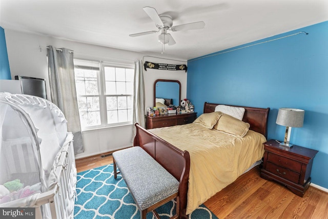 10103 Wimbledon Ct, Manassas, VA 20110 - bedroom featuring wood finished floors and a ceiling fan