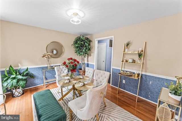 10103 Wimbledon Ct, Manassas, VA 20110 - dining space featuring wood finished floors, a wainscoted wall, and baseboards