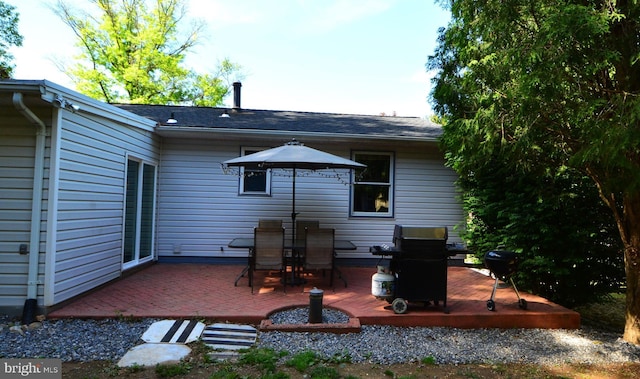 26 Shamrock Cir, Westminster, MD 21157 - back of house with a wooden deck, roof with shingles, and a patio