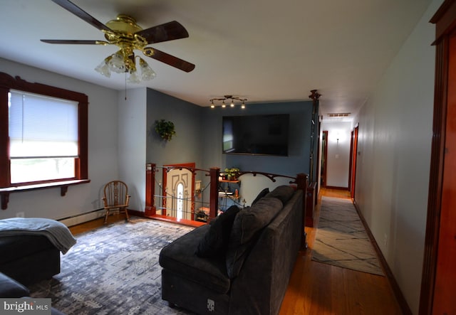 26 Shamrock Cir, Westminster, MD 21157 - living area featuring hardwood / wood-style floors, baseboards, and a ceiling fan