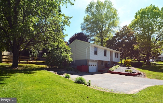 26 Shamrock Cir, Westminster, MD 21157 - view of side of home featuring driveway, an attached garage, and brick siding