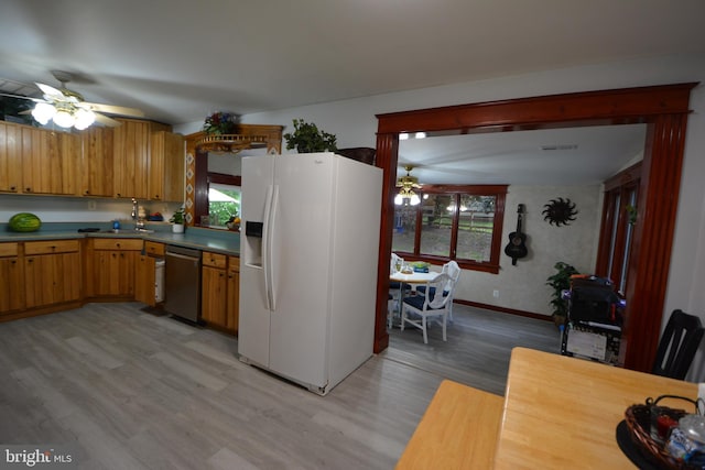 26 Shamrock Cir, Westminster, MD 21157 - kitchen with white refrigerator with ice dispenser, a ceiling fan, stainless steel dishwasher, and light wood-type flooring
