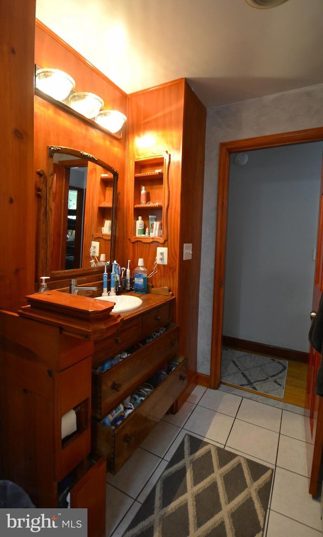 26 Shamrock Cir, Westminster, MD 21157 - bathroom with tile patterned floors, vanity, baseboards, and wooden walls