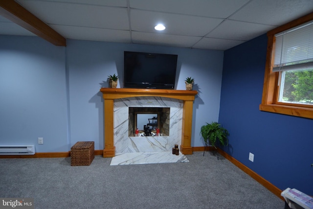 26 Shamrock Cir, Westminster, MD 21157 - living area featuring baseboard heating, carpet flooring, a fireplace, baseboards, and a paneled ceiling