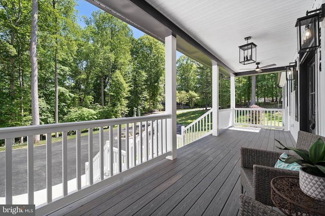 5570 Warren Dr, Huntingtown, MD 20639 - wooden porch with view of scattered trees