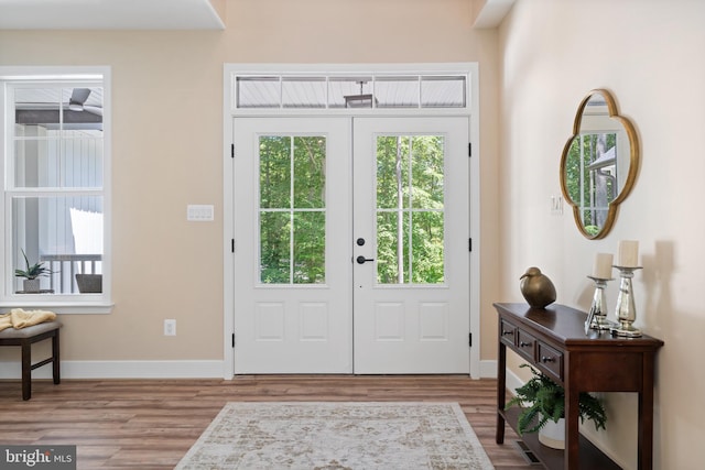 5570 Warren Dr, Huntingtown, MD 20639 - entryway featuring wood finished floors and baseboards