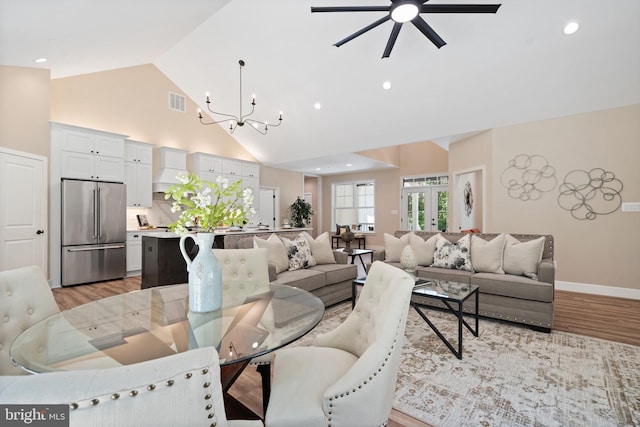 5570 Warren Dr, Huntingtown, MD 20639 - living area with light wood-type flooring, a chandelier, a ceiling fan, high vaulted ceiling, and recessed lighting
