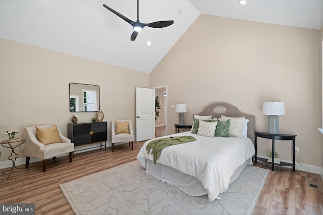 5570 Warren Dr, Huntingtown, MD 20639 - bedroom with high vaulted ceiling, wood finished floors, baseboards, ceiling fan, and recessed lighting