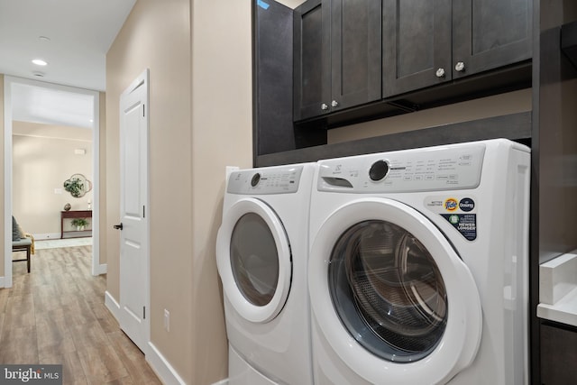 5570 Warren Dr, Huntingtown, MD 20639 - washroom with cabinet space, washing machine and clothes dryer, light wood-type flooring, baseboards, and recessed lighting