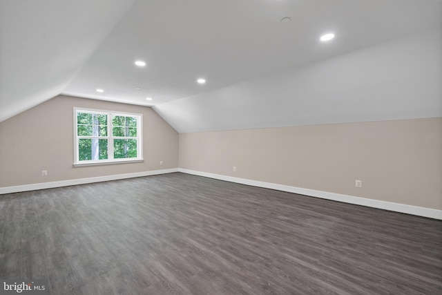 5570 Warren Dr, Huntingtown, MD 20639 - additional living space with dark wood-style flooring, baseboards, lofted ceiling, and recessed lighting