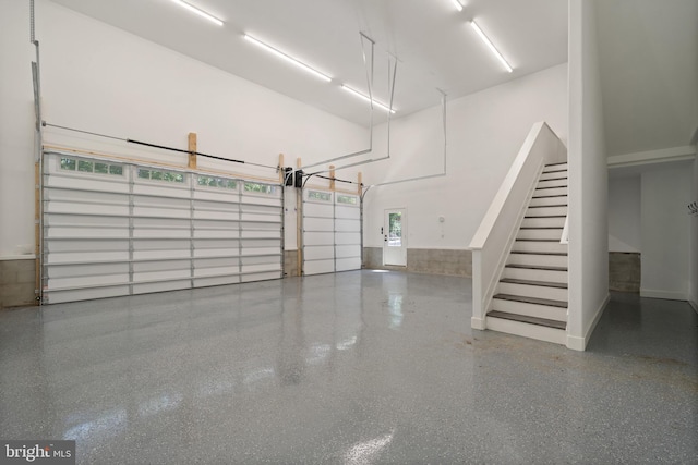 5570 Warren Dr, Huntingtown, MD 20639 - garage featuring baseboards