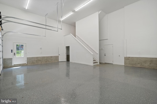 5570 Warren Dr, Huntingtown, MD 20639 - garage featuring a wainscoted wall