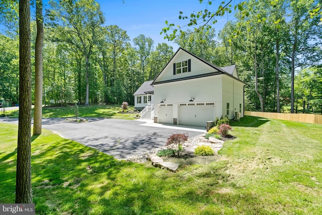 5570 Warren Dr, Huntingtown, MD 20639 - view of front of property featuring an attached garage and driveway