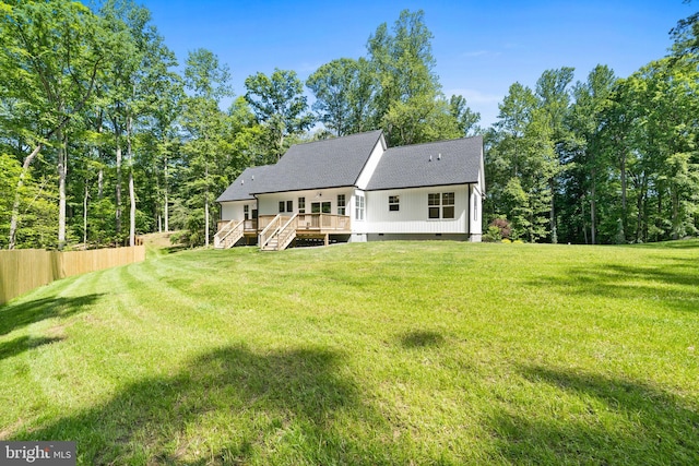 5570 Warren Dr, Huntingtown, MD 20639 - rear view of house featuring stairway, crawl space, a deck, and a shingled roof