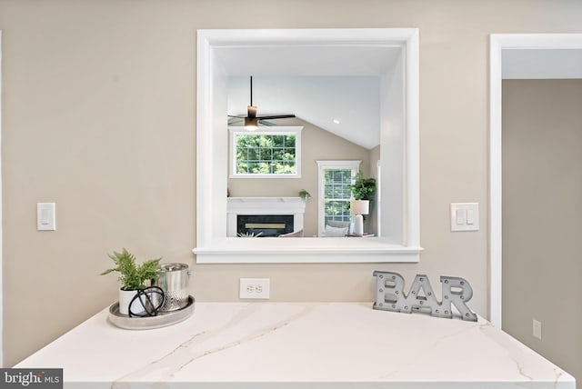 8002 Gosport Ln, Springfield, VA 22151 - detailed view of a high end fireplace and a ceiling fan