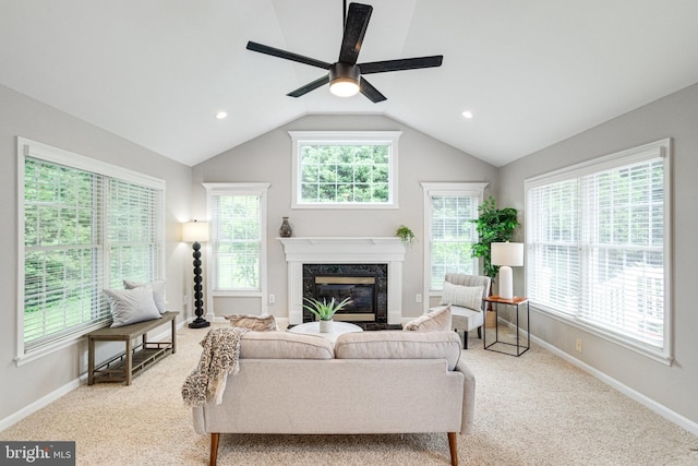 8002 Gosport Ln, Springfield, VA 22151 - carpeted living area with a ceiling fan, a premium fireplace, baseboards, vaulted ceiling, and recessed lighting