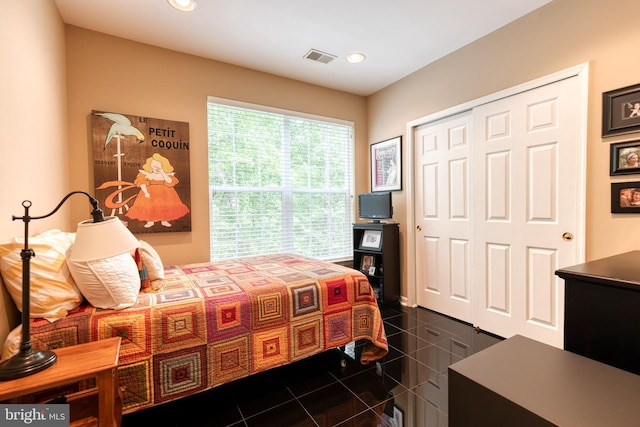 9663 Devedente Dr Unit 101, Owings Mills, MD 21117 - bedroom featuring a closet, recessed lighting, and granite floors