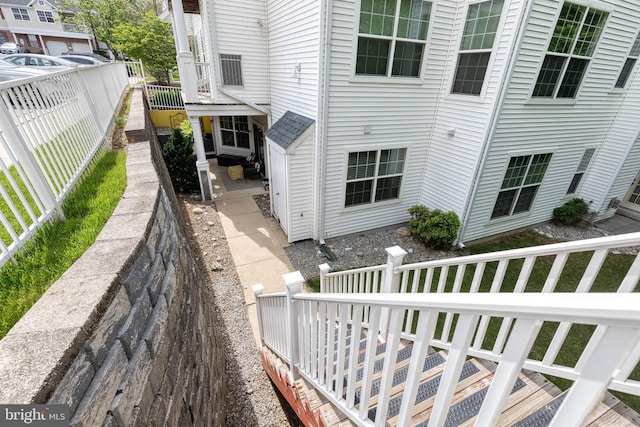 9663 Devedente Dr Unit 101, Owings Mills, MD 21117 - exterior space featuring a fenced backyard and a patio