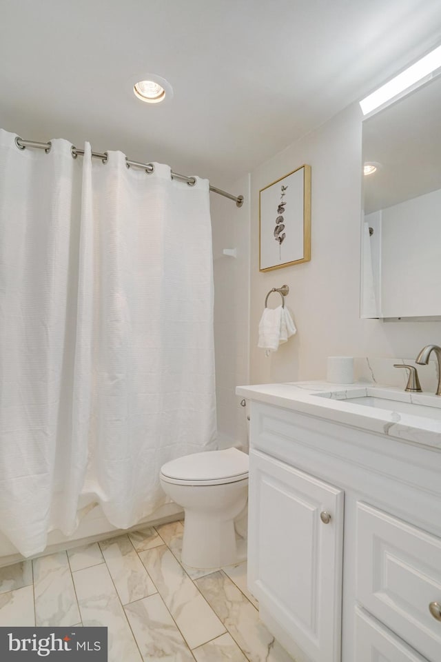 1300 Army Navy Dr Unit 124, Arlington, VA 22202 - bathroom featuring marble finish flooring, toilet, vanity, curtained shower, and recessed lighting