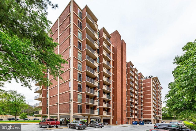 1300 Army Navy Dr Unit 124, Arlington, VA 22202 - view of property featuring uncovered parking