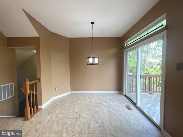 unfurnished dining area with baseboards