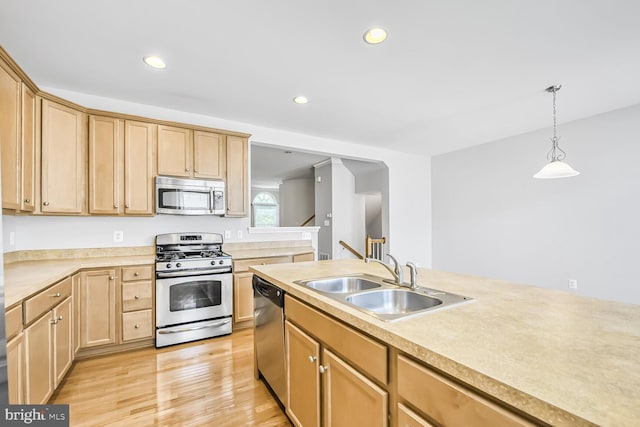 42952 Miltec Ter, Chantilly, VA 20152 - kitchen with appliances with stainless steel finishes, a sink, light brown cabinets, light countertops, and recessed lighting