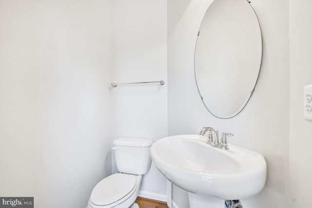 42952 Miltec Ter, Chantilly, VA 20152 - bathroom featuring a sink, toilet, and baseboards