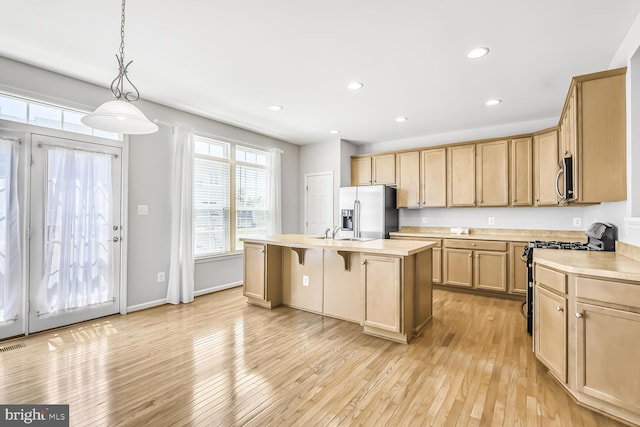 42952 Miltec Ter, Chantilly, VA 20152 - kitchen featuring stainless steel appliances, light countertops, a sink, plenty of natural light, and recessed lighting