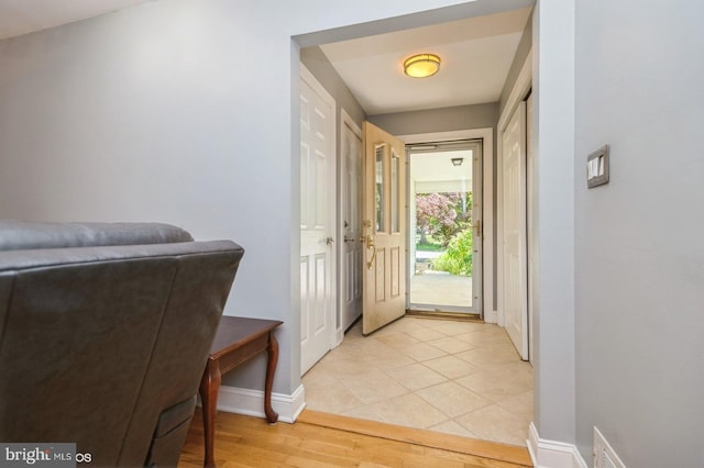30 Brooktree Rd, East Windsor, NJ 08520 - doorway to outside featuring baseboards and light wood-style floors